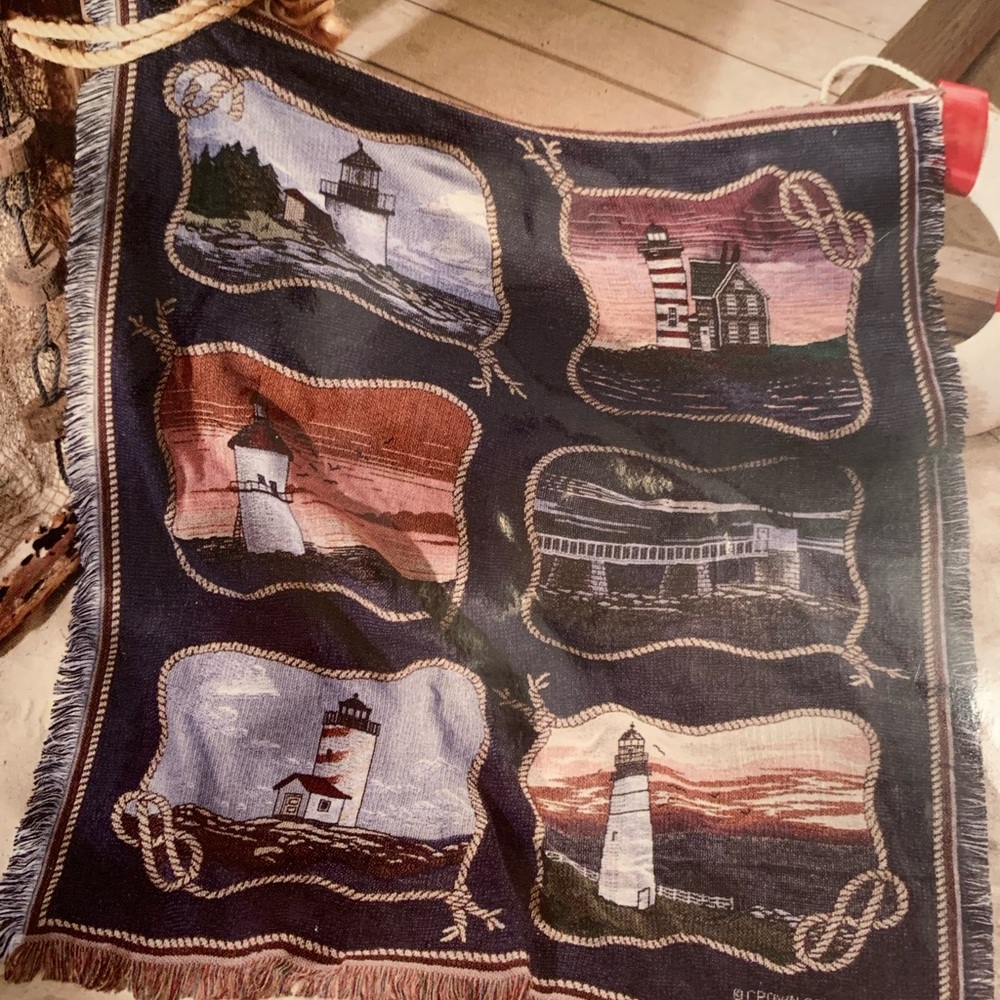 NWT Tapestry Throw. Nautical/ Lighthouses scenes. Size 50” X 60”.